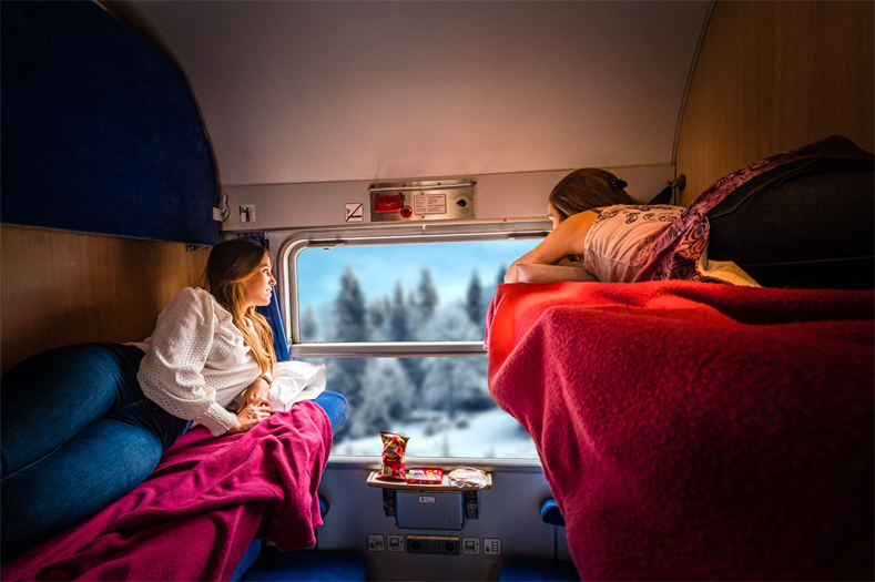 Met de nachttrein naar Oostenrijk begin je gezellig, comfortabel en duurzaam aan je skivakantie. © TUI