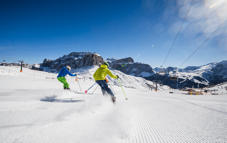 Op wintersport in Campitello kun je genieten van het prachtige berglandschap van de Dolomieten. © Verkeersbureau Val di Fassa.